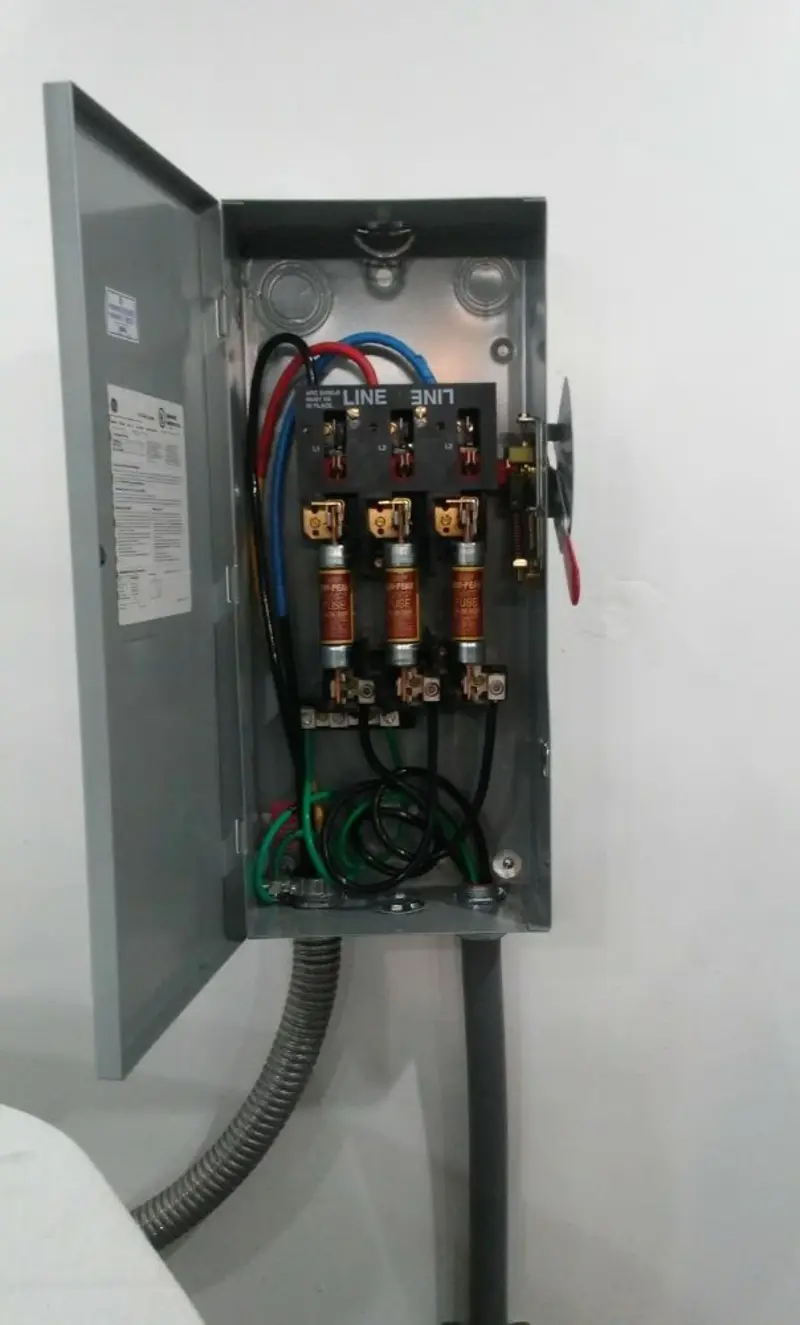 Three-phase disconnect switch installed for Smoke Detector Installation in Avalon